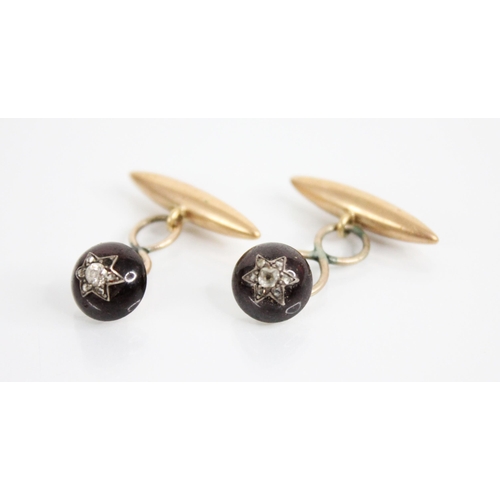 235 - A pair of Victorian garnet and diamond cufflinks, each principle link designed as a circular garnet ... 