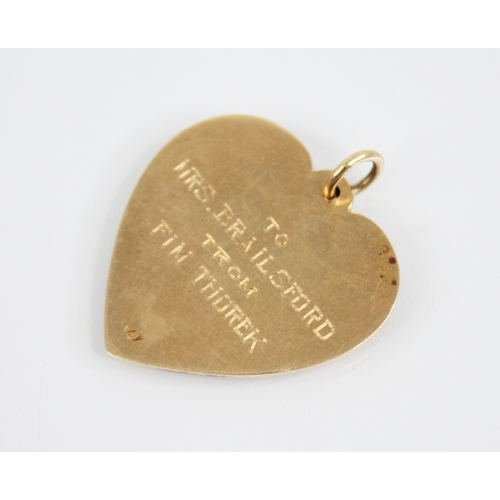 242 - A 14ct gold heart-shaped pendant, with applied crest for the  'Womens Auxiliary' of The Internationa... 