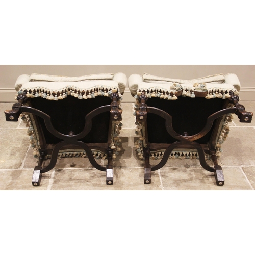 617 - A pair of William and Mary style armchairs, late 19th century, each with an upholstered arched back ... 