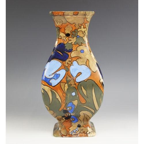 113 - A 1920s Bursley Ware Amstel pattern vase by Frederick Rhead, of square footed baluster form, printed... 