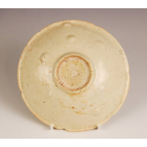 169 - A Chinese porcelain Song Dynasty (960 -1279) bowl, the pale celadon glazed bowl of small lobed propo... 