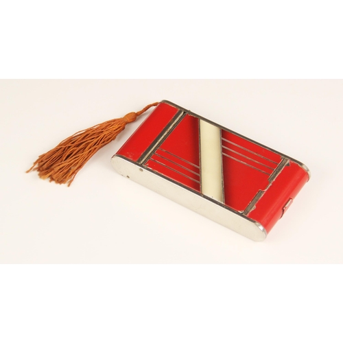 197 - An Art Deco chrome plate, red and cream enamel combination compact, cigarette case and lipstick in t... 