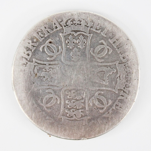 248 - A Charles II silver crown (date letter worn), obv. laureate and draped bust dexter, rev. crowned cru... 