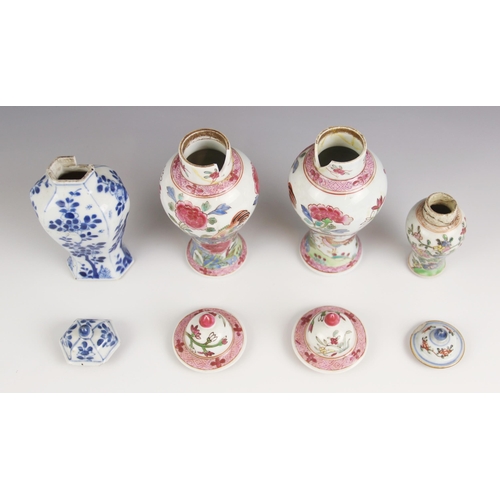 394 - A pair of Chinese porcelain vases and covers, 20th century, in the famille rose palette and of balus... 