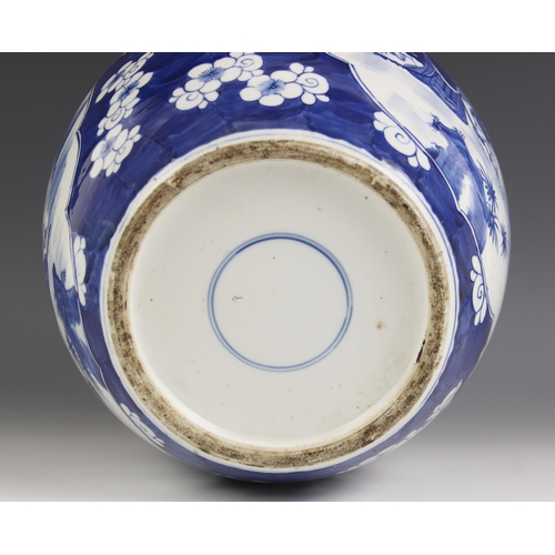 420 - A large Chinese porcelain blue and white ginger jar, 19th century, decorated with two reserves depic... 