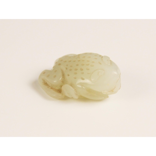 427 - A Chinese pale jade toad, 19th century, the celadon coloured carving modelled grasping a fruiting vi... 