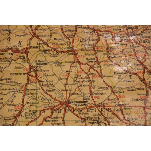 576 - A Phillips milestone motoring map, circa 1930, the lacquered canvas map depicting the new road numbe... 