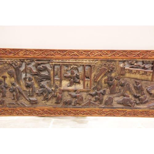 602 - A Chinese carved hardwood and gilt lacquered over mantel mirror, early 20th century, the rectangular... 