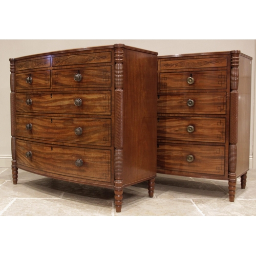 634 - A near pair of late George III mahogany bowfront chests of drawers, circa 1810, each chest with a cr... 