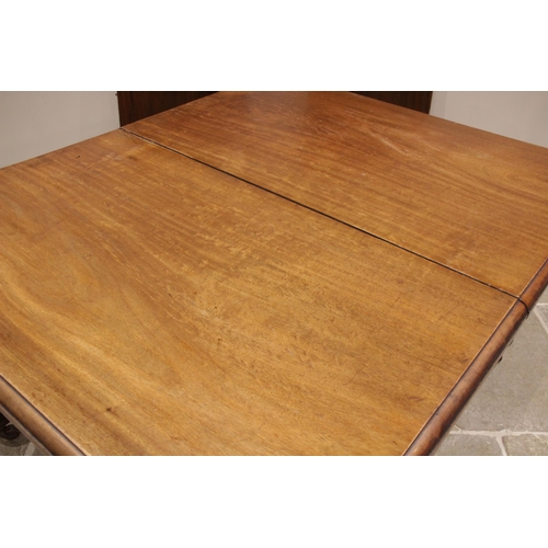 684 - A Victorian mahogany extending dining table, the rectangular moulded top with rounded corners, upon ... 