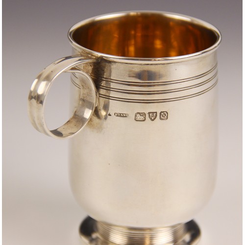 238 - A George VI silver christening mug, S Blanckensee & Son Ltd, Chester 1939, of tapering cylindrical f... 