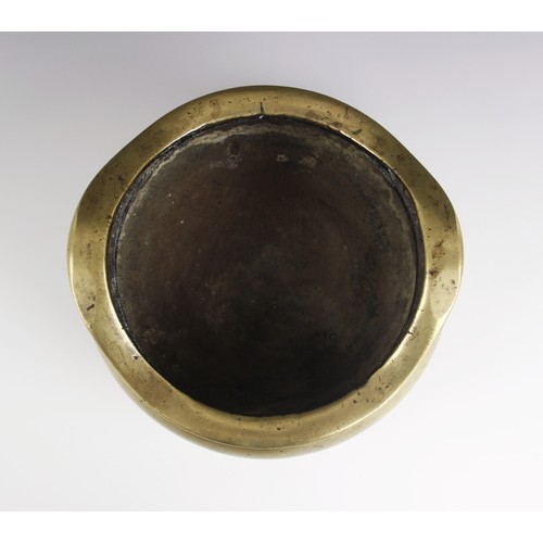 426 - A large and substantial Chinese bronze censer, 19th century, of compressed circular form with plain ... 