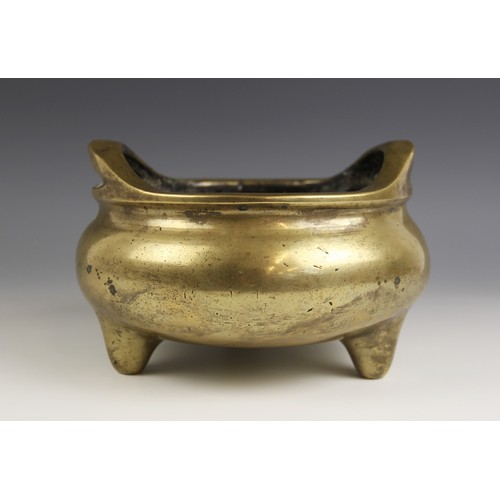 426 - A large and substantial Chinese bronze censer, 19th century, of compressed circular form with plain ... 