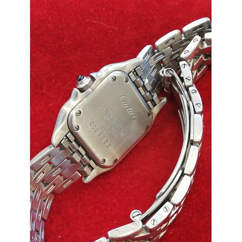 123 - A ladies Cartier Panthere stainless steel wristwatch, the white square dial with Roman numerals and ... 