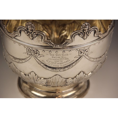 17 - A Victorian presentation bowl, Daniel & Charles Houle, London 1882, of circular form on domed foot, ... 