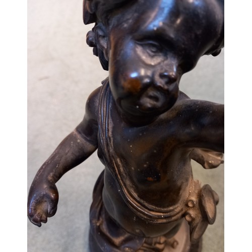 548 - Two patinated bronze putti, 19th century, each modelled as the infant Bacchus, one standing on a win... 