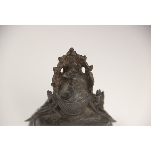 418 - A Sino-Tibetan bronze figure of buddha, 19th century, seated in dhyanasana, right hand in vitarka mu... 