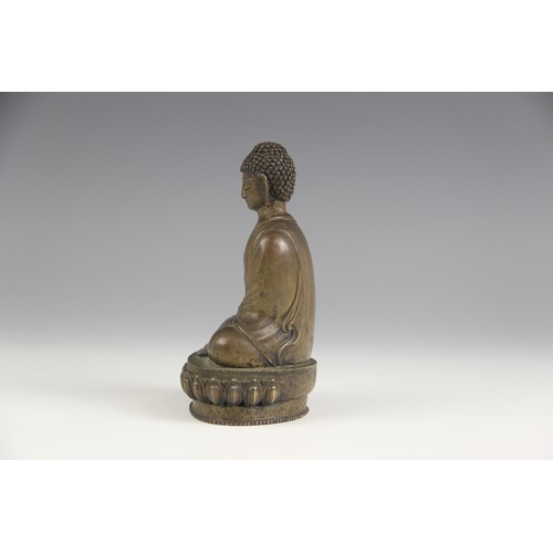 415 - A bronze model of Buddha, possibly Sino-Tibetan, 18th/19th century, modelled seated in dhyanasana on... 