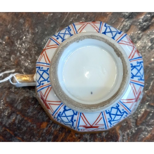 448 - A selection of porcelain teacups and saucers, 19th century, each of faceted London shape with flared... 