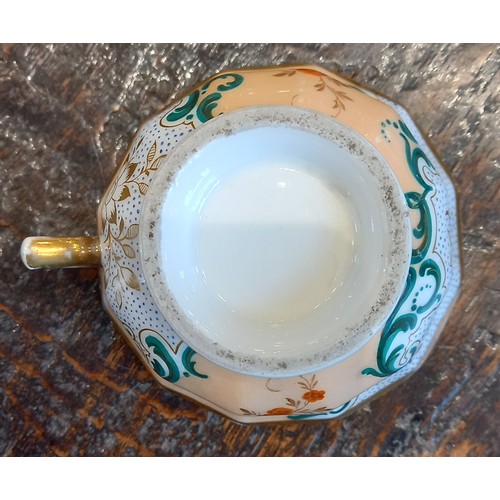 448 - A selection of porcelain teacups and saucers, 19th century, each of faceted London shape with flared... 