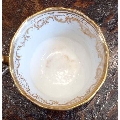 448 - A selection of porcelain teacups and saucers, 19th century, each of faceted London shape with flared... 