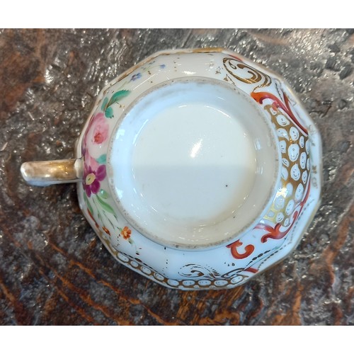 448 - A selection of porcelain teacups and saucers, 19th century, each of faceted London shape with flared... 