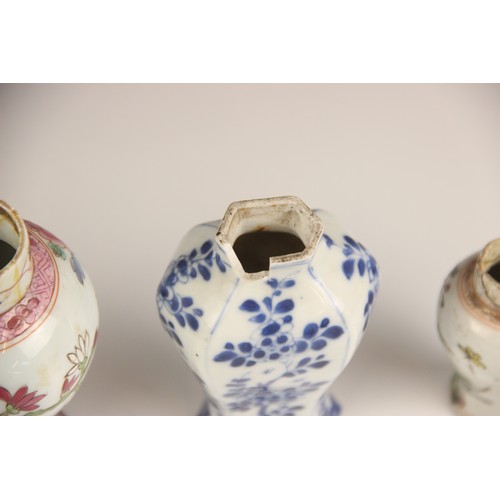 394 - A pair of Chinese porcelain vases and covers, 20th century, in the famille rose palette and of balus... 