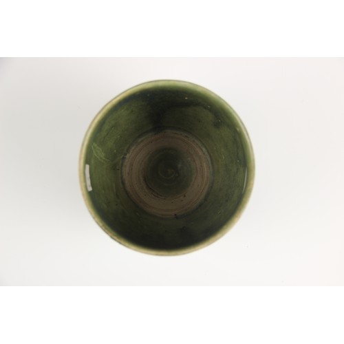 378 - An Anamese pottery vessel, possibly 15th century, the cylindrical vase celadon glazed to the interio... 