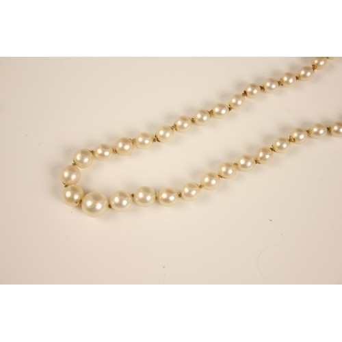 193 - An early 20th century cultured pearl necklace, designed as a single row of round cultured pearls, me... 