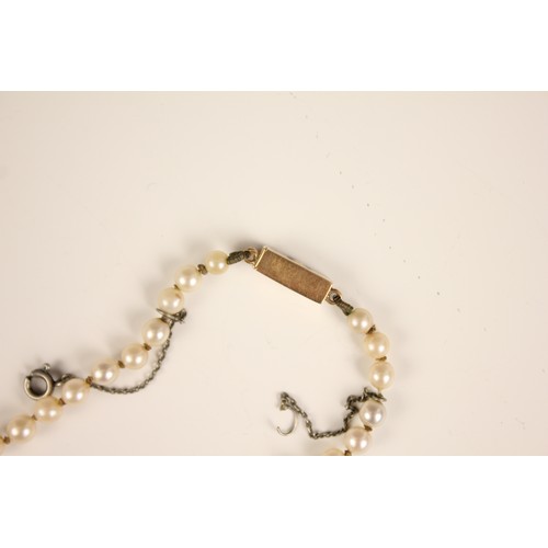 193 - An early 20th century cultured pearl necklace, designed as a single row of round cultured pearls, me... 