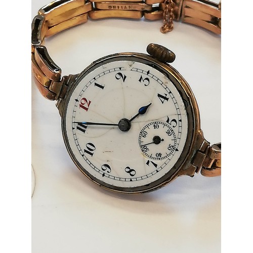 124 - A gentleman's vintage 9ct gold Felea wristwatch, the round white dial with Arabic numerals and outer... 