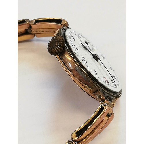 124 - A gentleman's vintage 9ct gold Felea wristwatch, the round white dial with Arabic numerals and outer... 