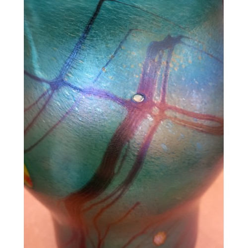 511 - A John Ditchfield for Glasform studio glass vase of waisted form, the iridescent green glass punctua... 