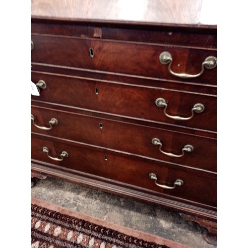 674 - A George III mahogany bureau, the quarter veneered fall front opening to a compartmentalised interio... 