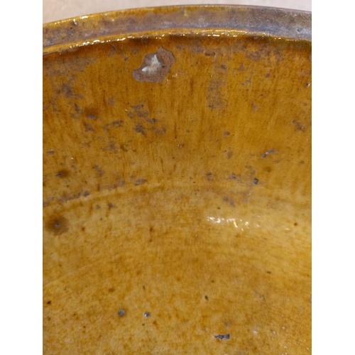 442 - A salt glazed earthenware bowl, probably British late 18th century, of wide shallow form with channe... 