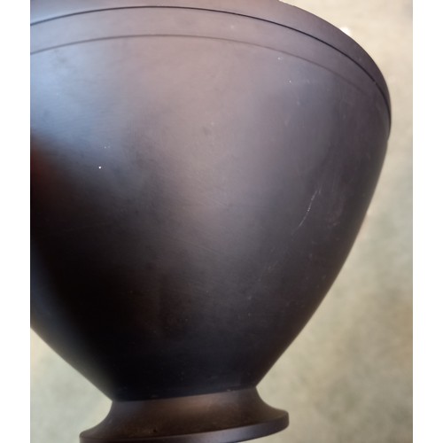 443 - A Wedgwood black basalt bowl by Keith Murray, circa 1933, of conical form with incised border and sp... 