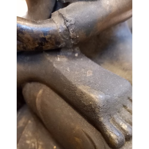 402 - A large Burmese bronze buddha, seated in  dhyanasana with hands placed in bhumisparsha mudra, sat up... 