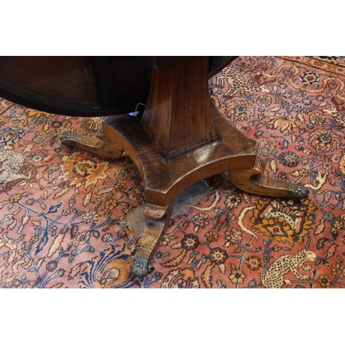 641 - A Regency rosewood and brass inlaid breakfast table, in the manner of George Oakley, early 19th cent... 