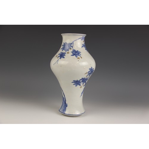 422 - A Chinese porcelain vase, 19th century, the inverted baluster shaped vase decorated with an owl perc... 