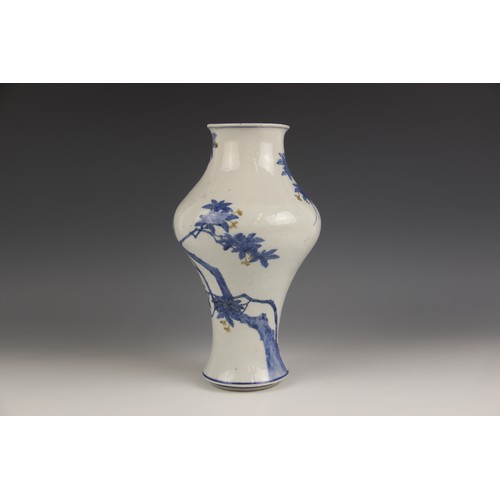 422 - A Chinese porcelain vase, 19th century, the inverted baluster shaped vase decorated with an owl perc... 