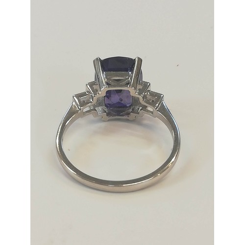 207 - A colour-change sapphire and diamond ring, the rectangular cushion mixed cut sapphire weighing 4.20 ... 