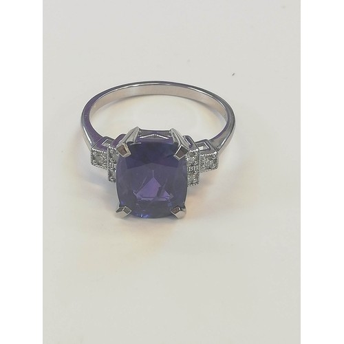 207 - A colour-change sapphire and diamond ring, the rectangular cushion mixed cut sapphire weighing 4.20 ... 