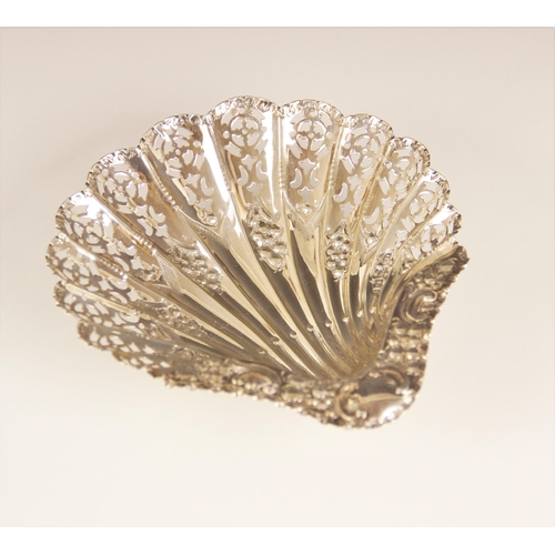 103 - A Victorian silver shell shaped dish, Atkin Brothers, Sheffield 1898, with embossed floral and pierc... 