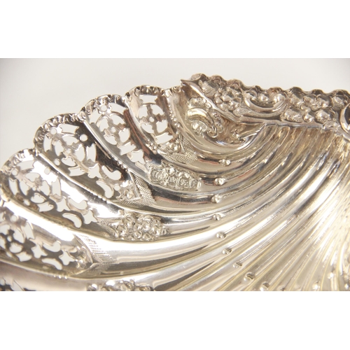 103 - A Victorian silver shell shaped dish, Atkin Brothers, Sheffield 1898, with embossed floral and pierc... 