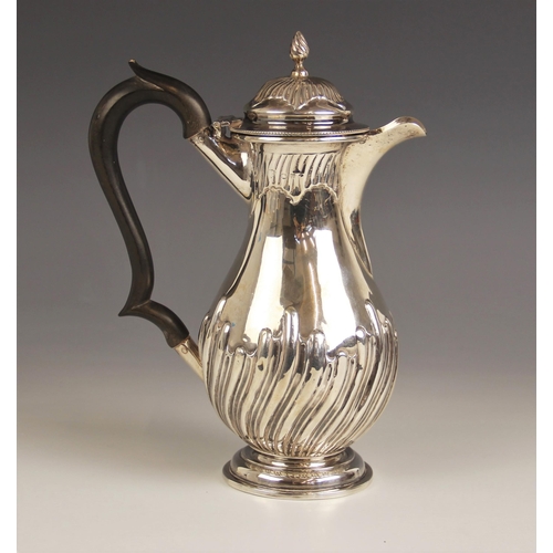 107 - An early 20th century silver bachelors coffee pot, Nathan and Hayes, Chester, date mark rubbed, of b... 