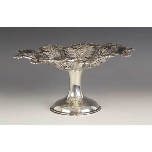 114 - An Edwardian silver pedestal comport, S Glass, Birmingham, 1903, the circular pierced body with embo... 