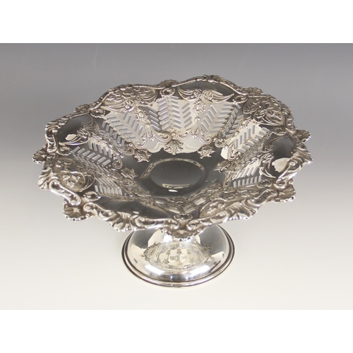 114 - An Edwardian silver pedestal comport, S Glass, Birmingham, 1903, the circular pierced body with embo... 