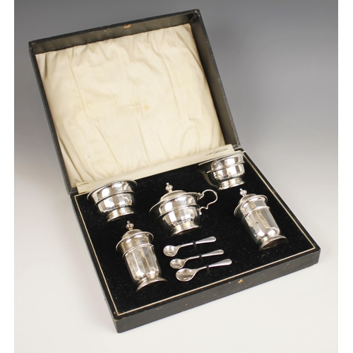 117 - A George V silver condiment set, Adie Brothers, Birmingham 1932, comprising two open salts, two pepp... 