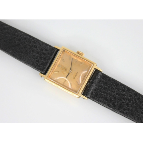 133 - A 18ct gold ladies Omega Ladymatic wristwatch, the square gold toned dial with baton markers, set to... 