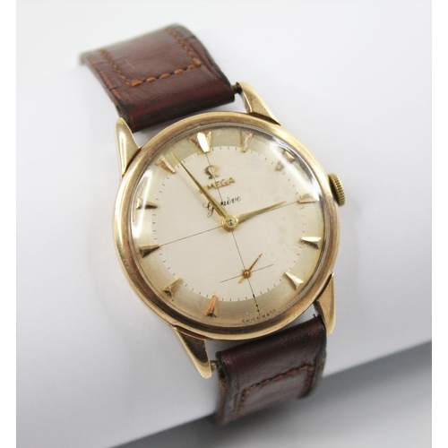 134 - A gentleman's vintage 9ct gold Omega Geneve wristwatch, the two-toned circular dial with arrowhead m... 